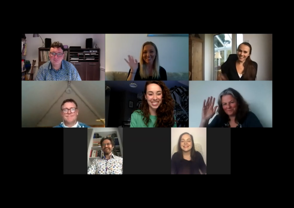 Screengrab of a Zoom video call with people waving
